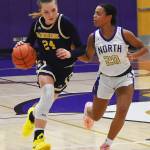 Spartan Bella Ramirez drives past Viking Coriana McMillian.