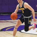 Bainbridges Sam Nylund drives to the hoop for the layup.