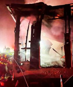 NKFR courtesy photo
Firefighters control a Jan. 22 manufactured home fire near Indianola within 30 minutes of arrival, but it took several more hours to fully extinguish the hot spots.