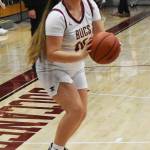 Buc Jayla Moon scores a three pointer.