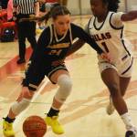 Nicholas Zeller-Singh/Bainbridge Review Photos
Spartan Bella Ramirez battles Annique Smith of Silas.