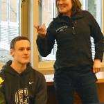 Nicholas Zeller-Singh/Kitsap News Group
Bodie Strom, shown with Bainbridge coach Ann Howard Lindquist, signs a letter of intent to run in college.