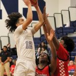 Viking Harry Davies puts up a shot in the second half against Renton.