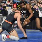 Viking Morgan Paul defends a shot attempt.