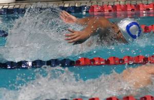 Nicholas Zeller-Singh/Kitsap News Group Photos
Trojan Jerrick Castillo does the breaststroke for the relay team.