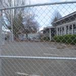 A fence has been placed around the old police station on Bainbridge. The council will look to OK a contract to demolish the building March 12.