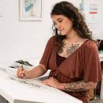 Leah Thompson Photography courtesy photo
Local artist Ana Dueñas sketches a drawing at Stinging Nettle Studio in Kingston.