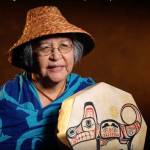 Molly Hetherwick/Kitsap News Group
Indipino elder Bethany Mapanao displays the drum her brother painted for her with an image of her animal, a wolf. She is also wearing a woven cedar hat from the Lummi tribe, which she wears with pride.