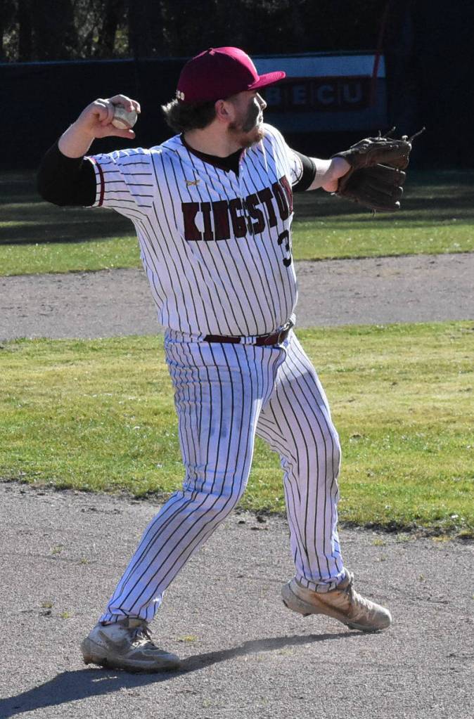 Buc Gavin Garner makes a throw to first base.