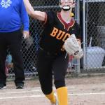Buc Nevaeh Sullivan makes a throw to first base.