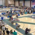 Damon Williams/Kitsap News Group photos
A pavilion at the Kitsap County Fairgrounds in Bremerton is packed with people and dogs March 23 for the Peninsula Dog Fanciers Club obedience competition. Dogs of many types of breeds, and their handlers, competed in the event.
