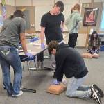 SKSD courtesy photo
Gavin Schlatter, a junior at Discovery High School, performs CPR on a dummy.