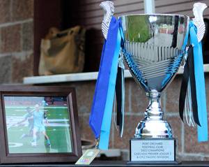 Elisha Meyer/Kitsap News Group photos
The championship trophy from POFCs perfect inaugural season displayed at the entrance of Kitsap Bank Stadium for the clubs tryouts.