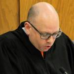 Kitsap County Superior Court Judge Kevin Hull reads the guilty verdicts handed down by jurors.
