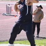 Viking Jesus Mares wins the shot put.