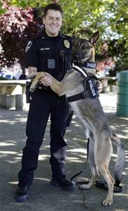 File photo
Poulsbo police officer Nick Hoke and K-9 Kilo back in 2014. The department will be bringing back its K-9 program to help enhance its drug enforcement efforts.
