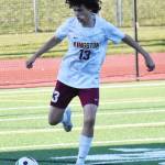 Buc Griffin Clark passes the ball upfield.
