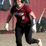Senior Ryleigh Wotzka heads down the third-base line in the final inning of a game against the Spartans.