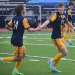 Bainbridge celebrates a 4-0 victory against Sequim.
