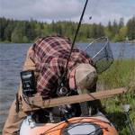 Damon Williams/Kitsap News Group
Tyler Hugg prepares his kayak for a day of fishing.