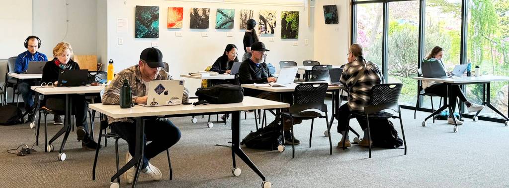 The conference room at the library was filled with people needing internet.