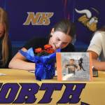 Nicholas Zeller-Singh/Kitsap News Group
Allison Dvorak, Hannah Richards and Cerenity Fake sign their letters of intent.