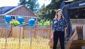Elisha Meyer/Kitsap News Group
West Sound Tech director Shani Watkins makes a statement in front of the site of the newest Habitat for Humanity home.