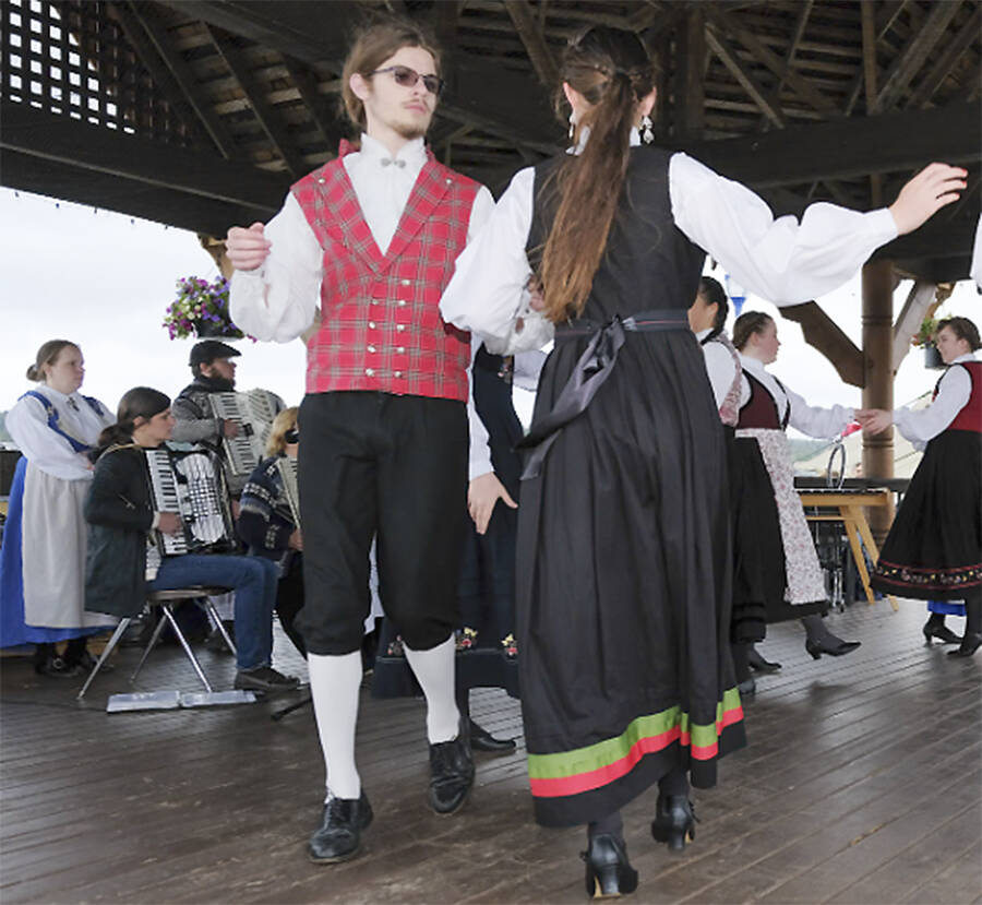 The Leikarringen dancers in their traditional costumes entertain the Viking Fest crowds.