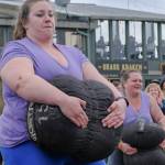 Christina Tangelin totes a 150-pound sandbag as the last part of the Pillage Series event in the Strongest Woman competition.
