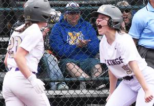 File photos
North Kitsap celebrates its opening round victory.