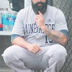 File photo
Geoff Brown passes along signals to his catcher during a postseason game in Kent.