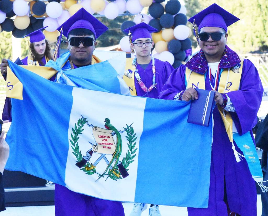 North Kitsap graduates celebrate with the Argentinian flag.
