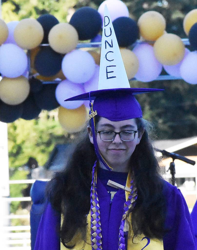 Several NK graduates decorate during graduation.