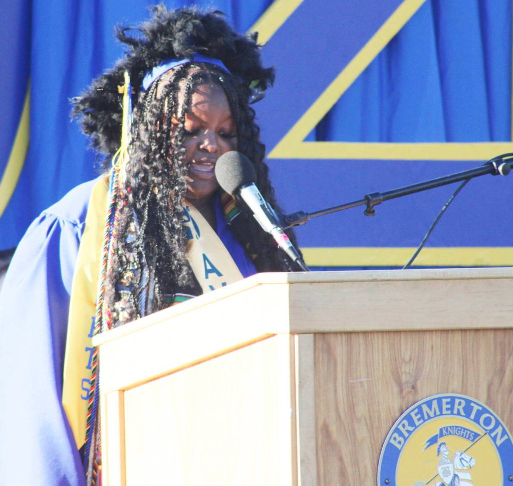 Senior class speaker Nhazyeiah Smithson congratulates her classmates on a job well done.