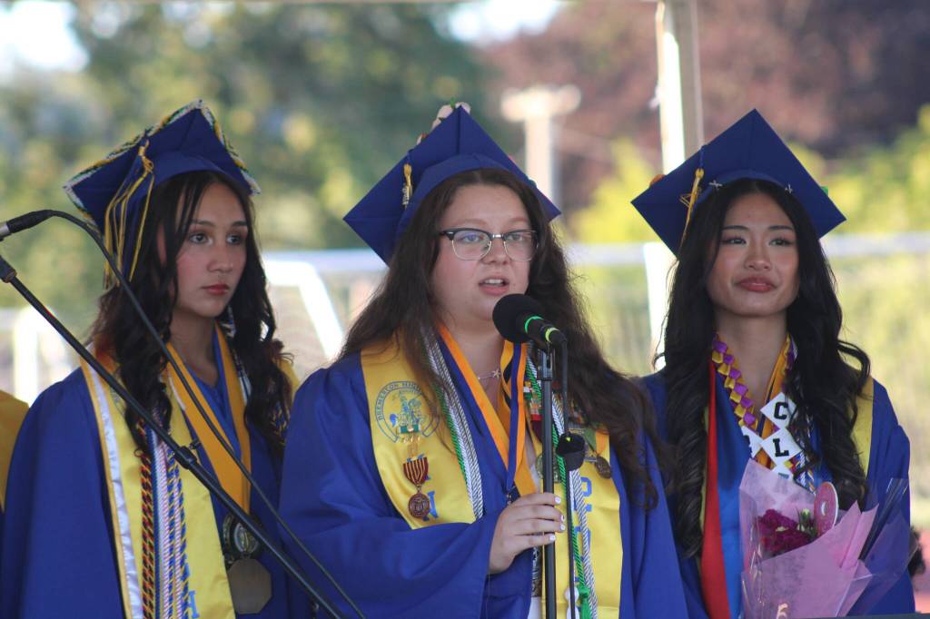 Senior choir members sing I Lived in their last performance at graduation.