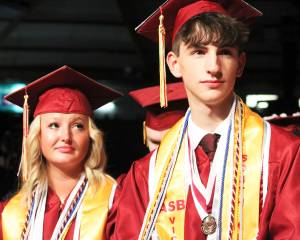 Elisha Meyer/Kitsap News Group photos
Graduates listen in on a senior classmates speech at the South Kitsap graduation.