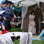 Corra the Heavy Metal Selke, left, and Marina and Mermaid discuss the finer points of mermaiding at the festival.