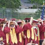 KHS seniors turn their tassels to signify their graduation.