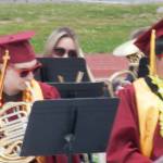 Graduates play in the KHS band one final time.