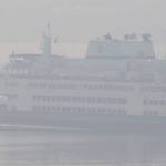 KPHD courtesy photos
Its not a foggy day. Thats smoke from a wildfire hiding one of the Washington State Ferries.