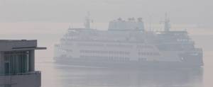 KPHD courtesy photos
Its not a foggy day. Thats smoke from a wildfire hiding one of the Washington State Ferries.