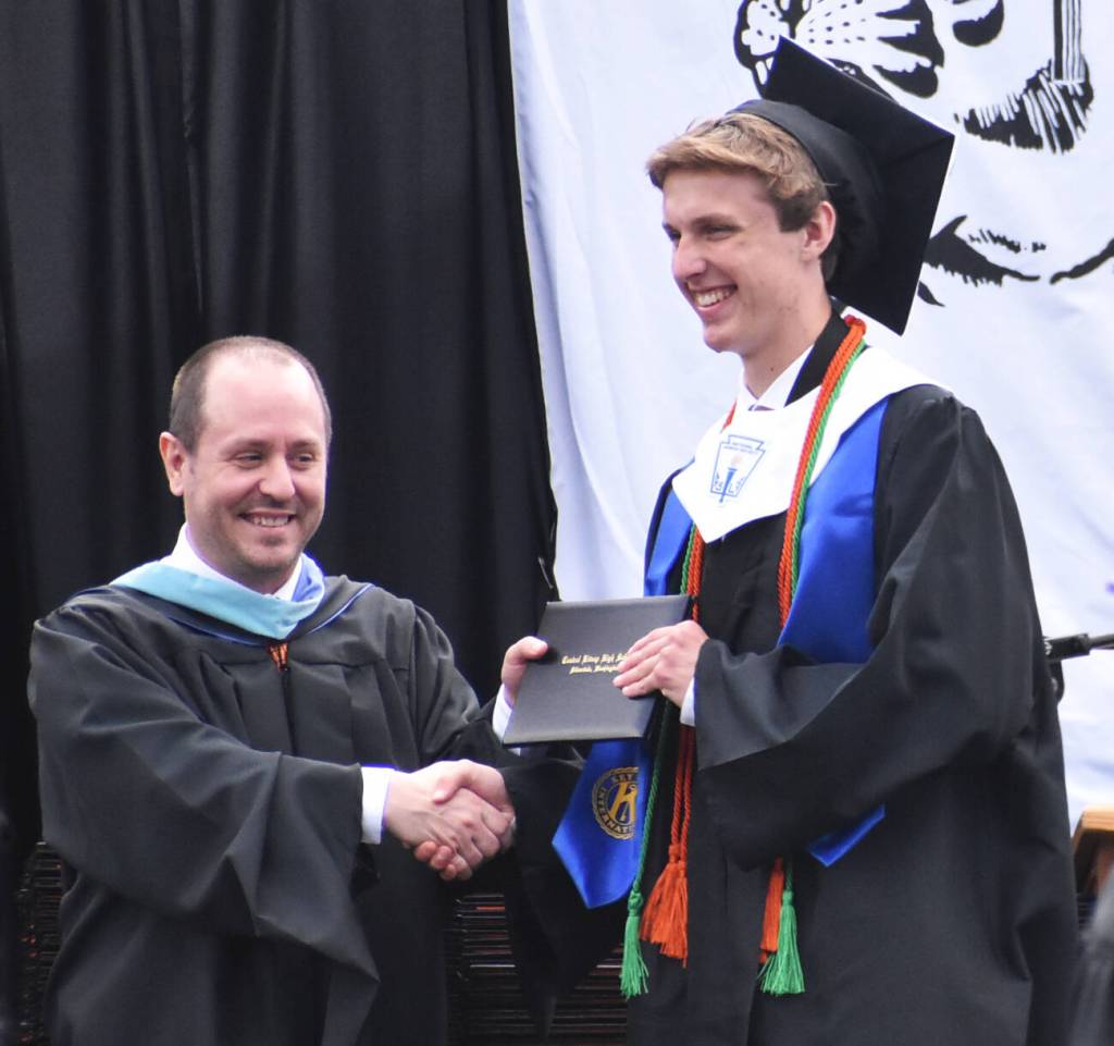 CK valedictorian Jackson Moyer accepts his diploma.