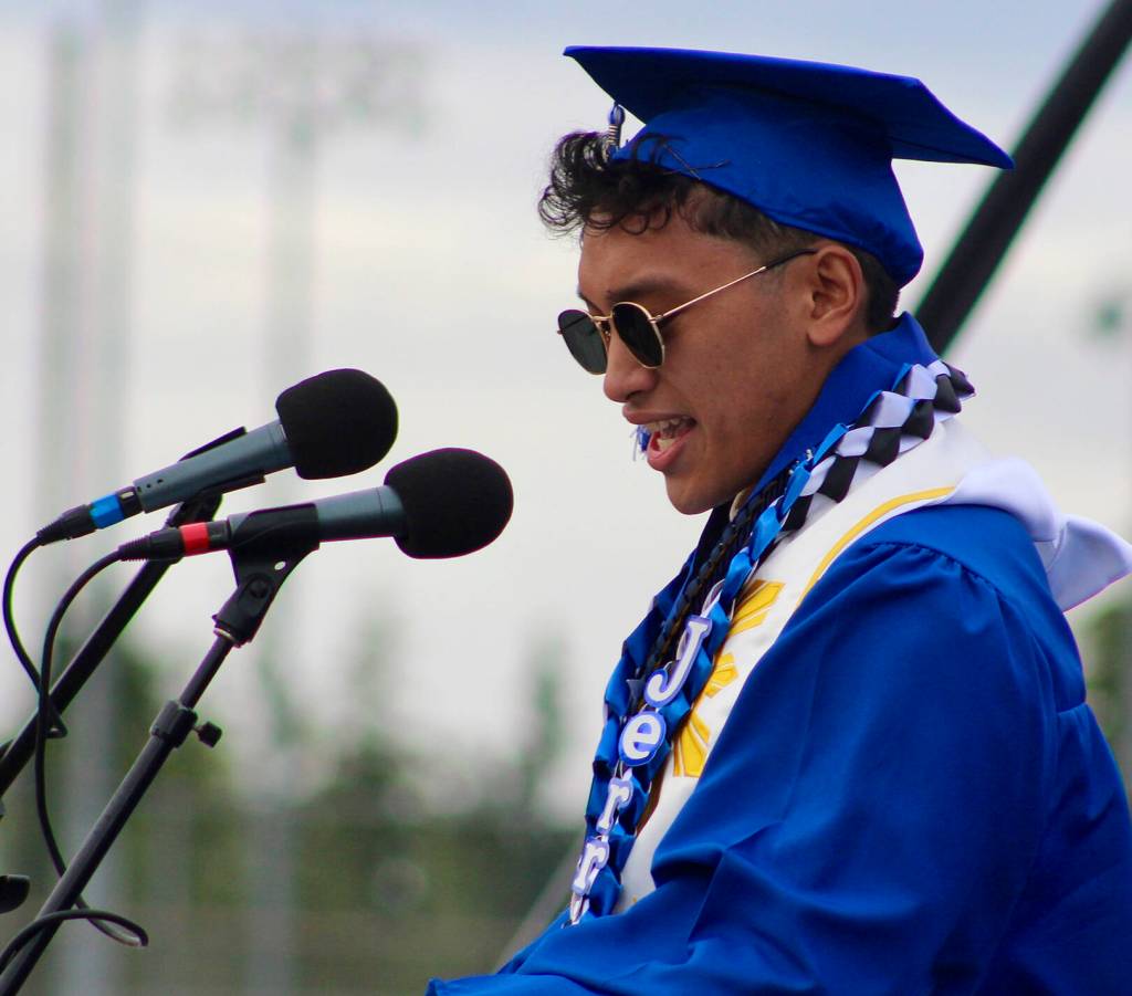 Class valedictorian Jerrick Castillo rocks some shades while addressing his classmates.