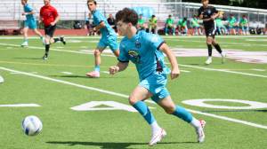 Elisha Meyer/Kitsap News Group photos
POFCs Derek Johnson dribbles the ball downfield.