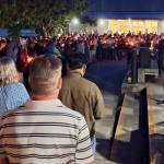 Elisha Meyer/Kitsap News Group photos
Hundreds light their candles in honor of Dave Snyder before joining together in singing Amazing Grace.