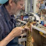 Jas Linford has a musical instrument repair shop.