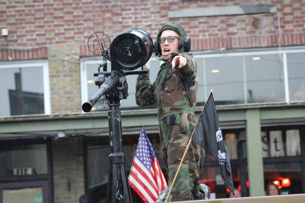 Some paraders brought big cars. This guy packed the big guns.
