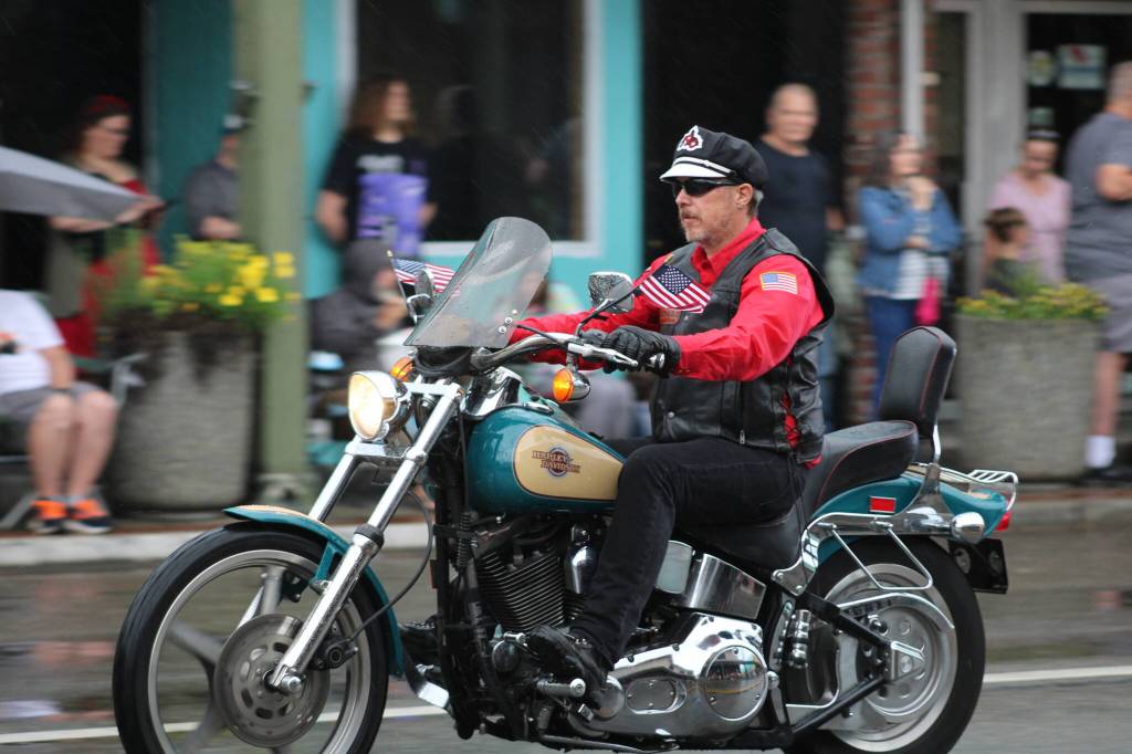 The Tenino Motorcycle Drill Team keeps cool under the rainfall.
