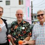 Matt Carter stands between the $500 Great Ball Race winners Karen and Chuck Rider.