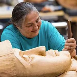 BIPTF courtesy photo
Randi Purcer carves a welcome pole.
